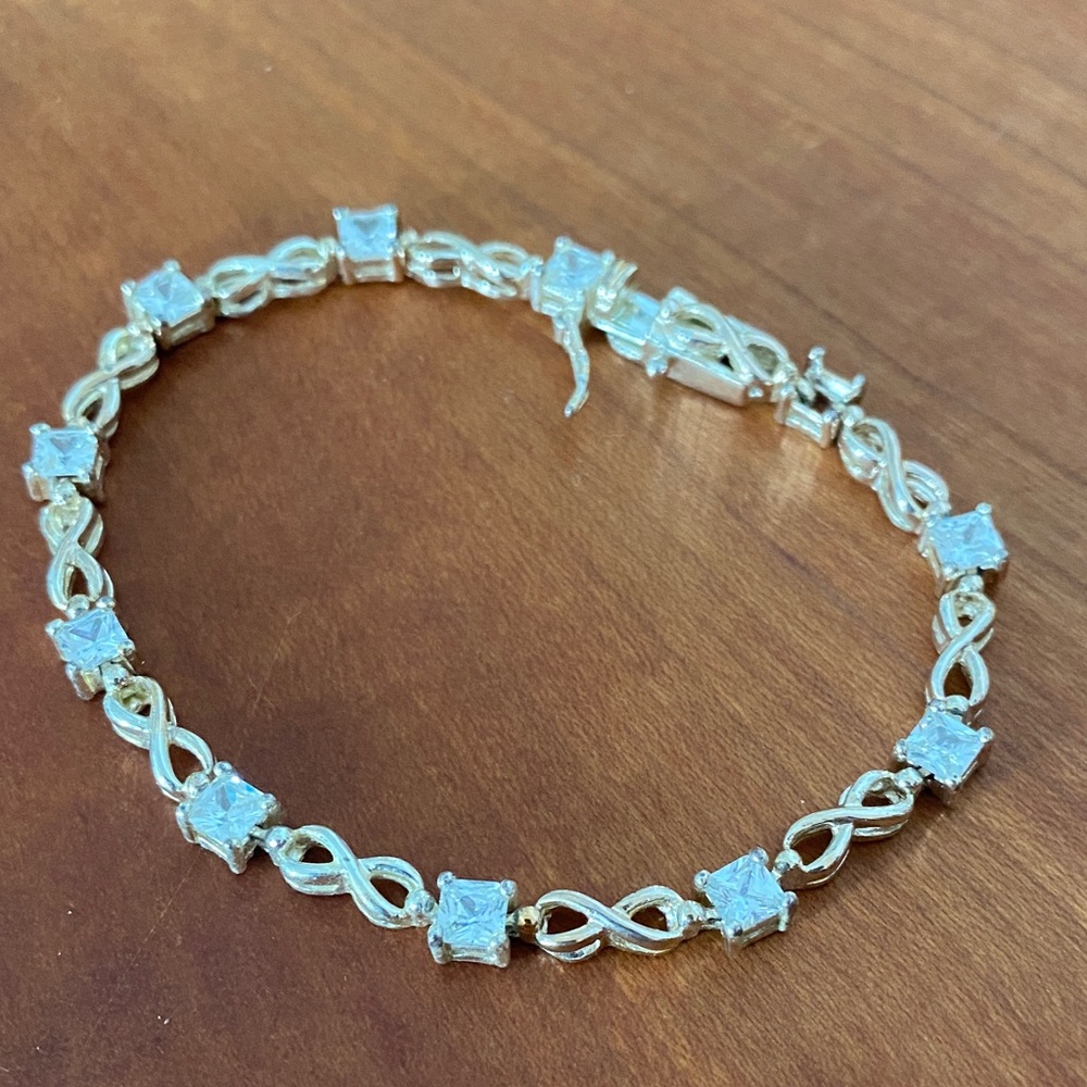 Elegant Roman Silver Toned and CZ Infinity Bracelet